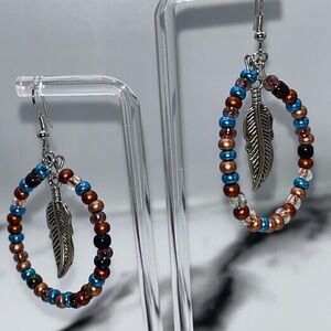 Beaded Hoop Earrings with Silver Feather Charm